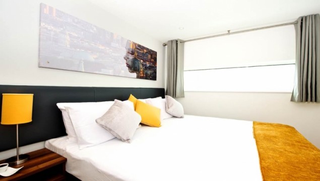 Bangkok serviced apartment bedroom with towels, and bed linen 